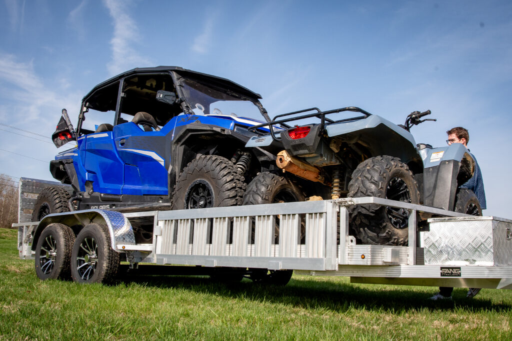 polaris and atv on double axle aluminum trailer