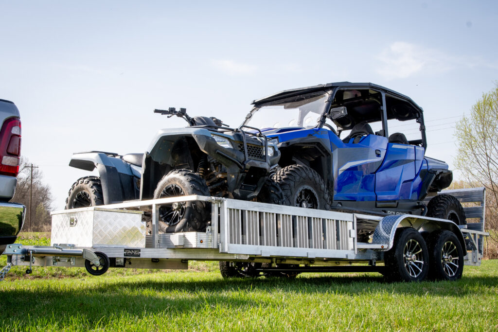 polaris and atv on double axle aluminum trailer