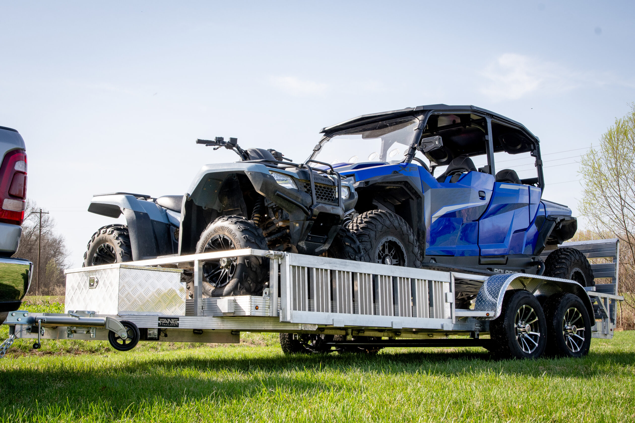 polaris and atv on double axle aluminum trailer