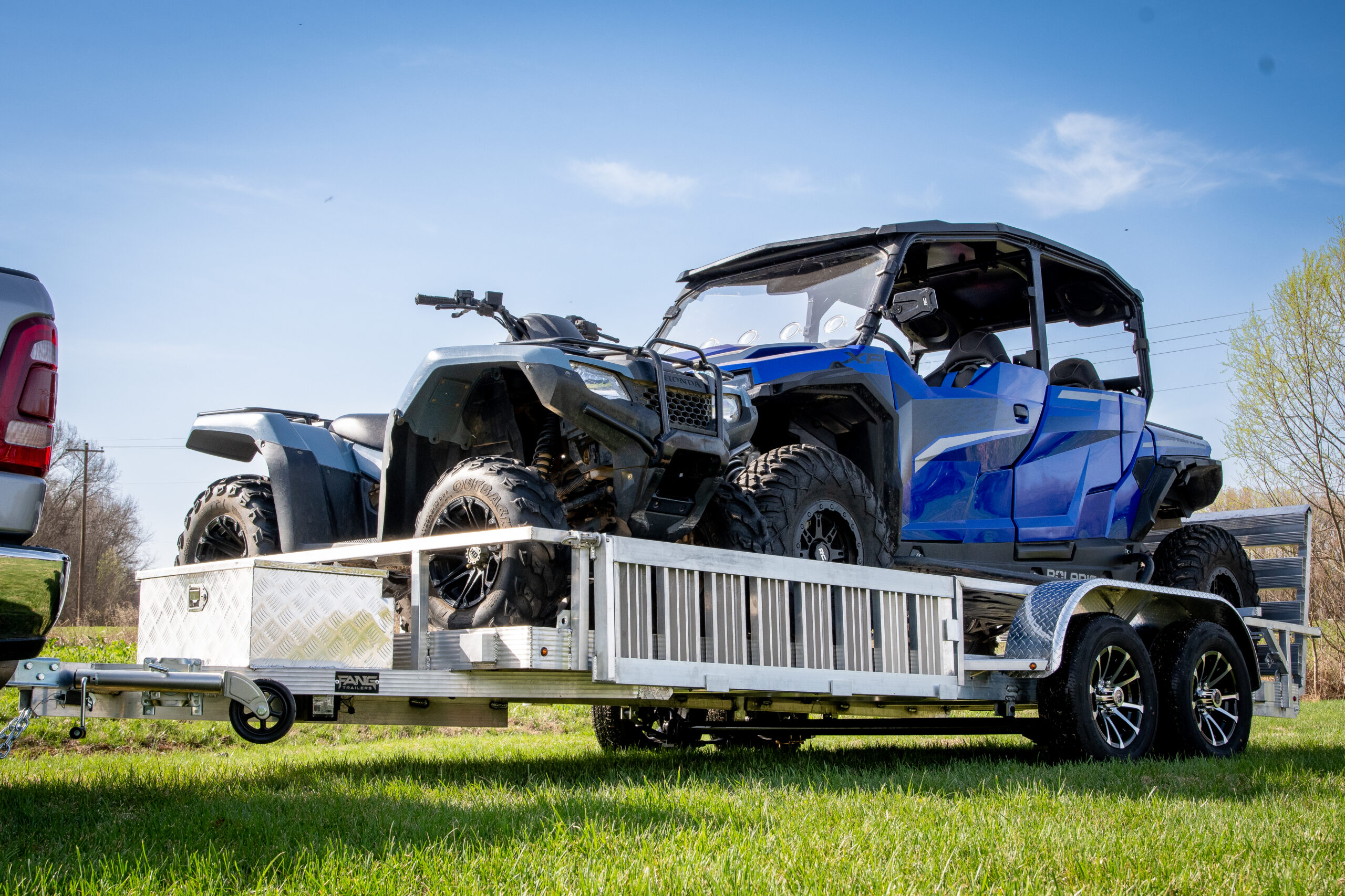 polaris and atv on double axle aluminum trailer
