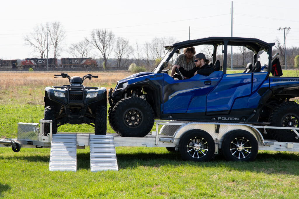 polaris and atv on double axle aluminum trailer